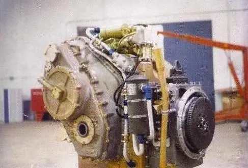 A large engine with many parts on it