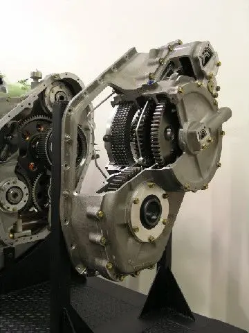 A close up of an engine with many gears