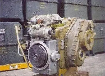 A large engine sitting on top of a concrete floor.